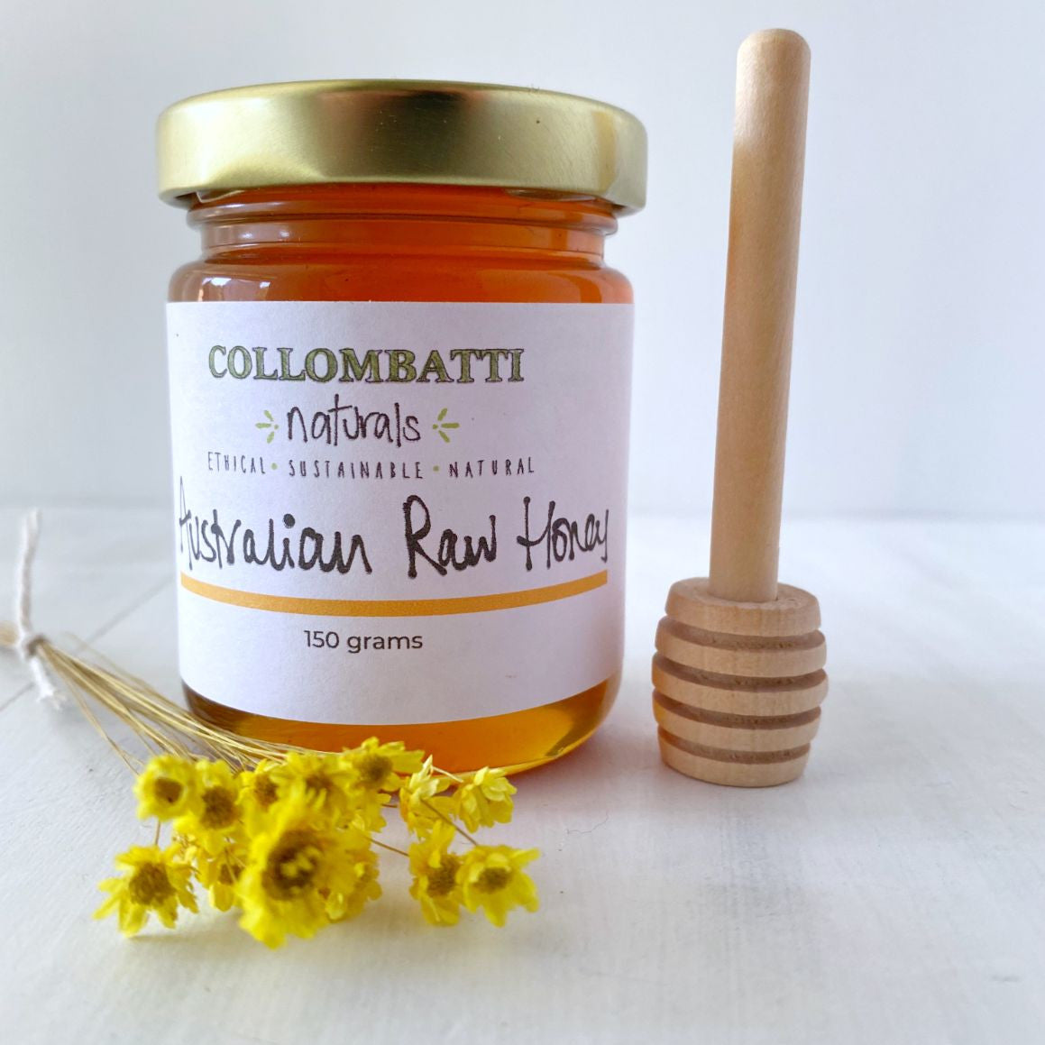 Collombatti Naturals raw Australian honey with wooden swizzle stick